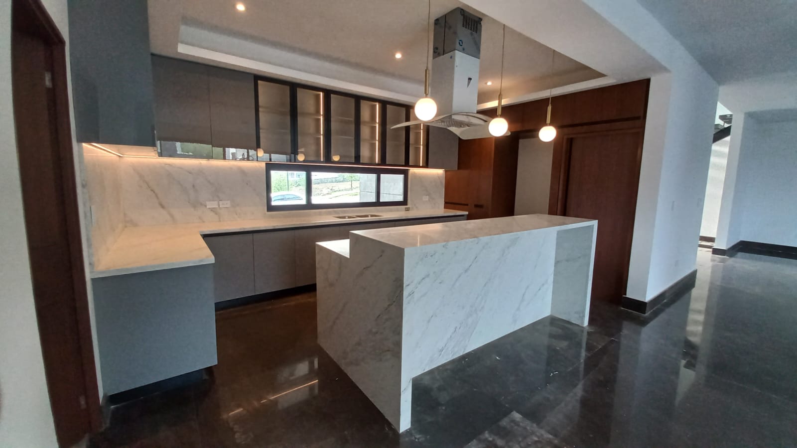 Modul Woods custom kitchen — island and range hood